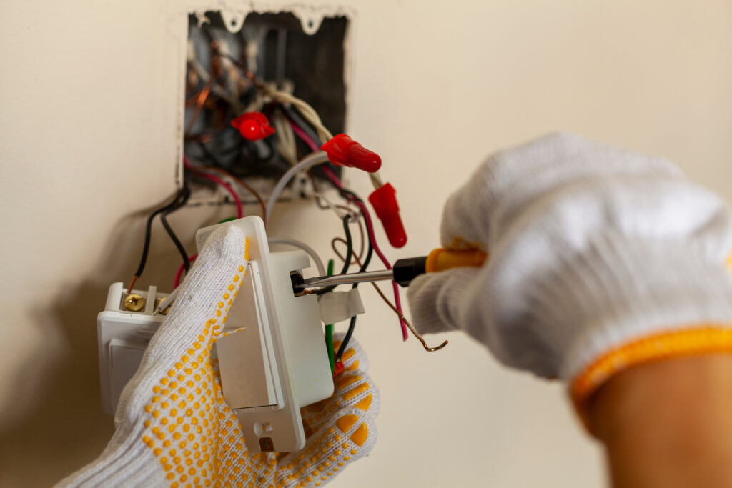 Electrical technician at work